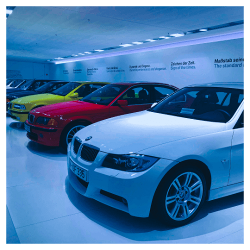 Loans and Finance: A row of BMW's inside of a Dealership