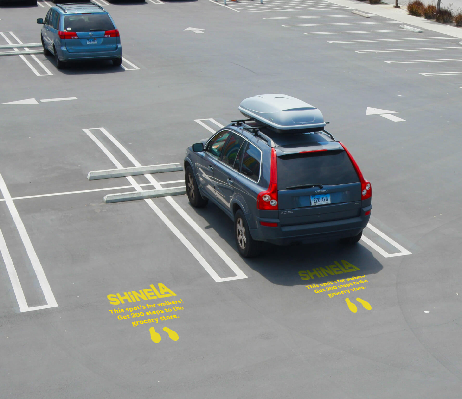 Arial photo of a car in a spot with a call to action to park there painted on the road to encourage more steps in the parking lot., the stairs have a mockup encouraging people to stay fit with call to action parking space painted.